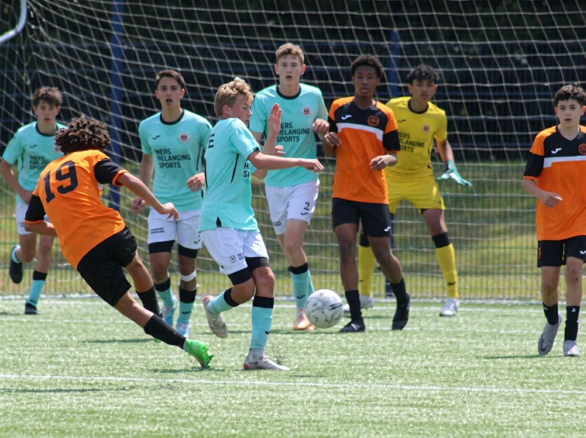 ISD Academy player striking the ball in training